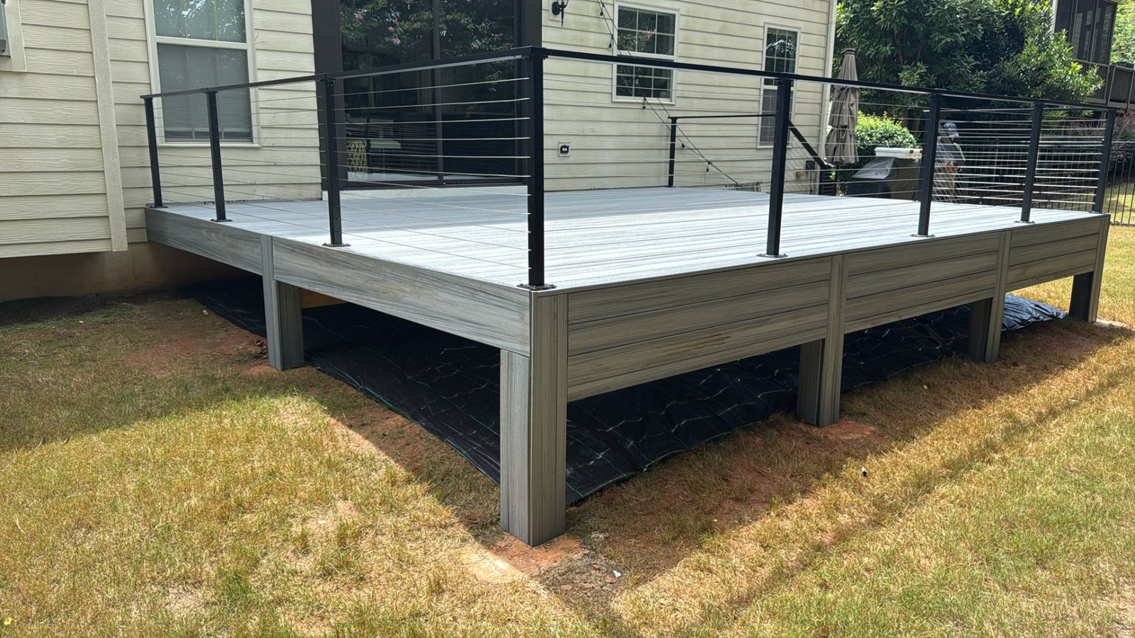 Composite deck with black cable railing