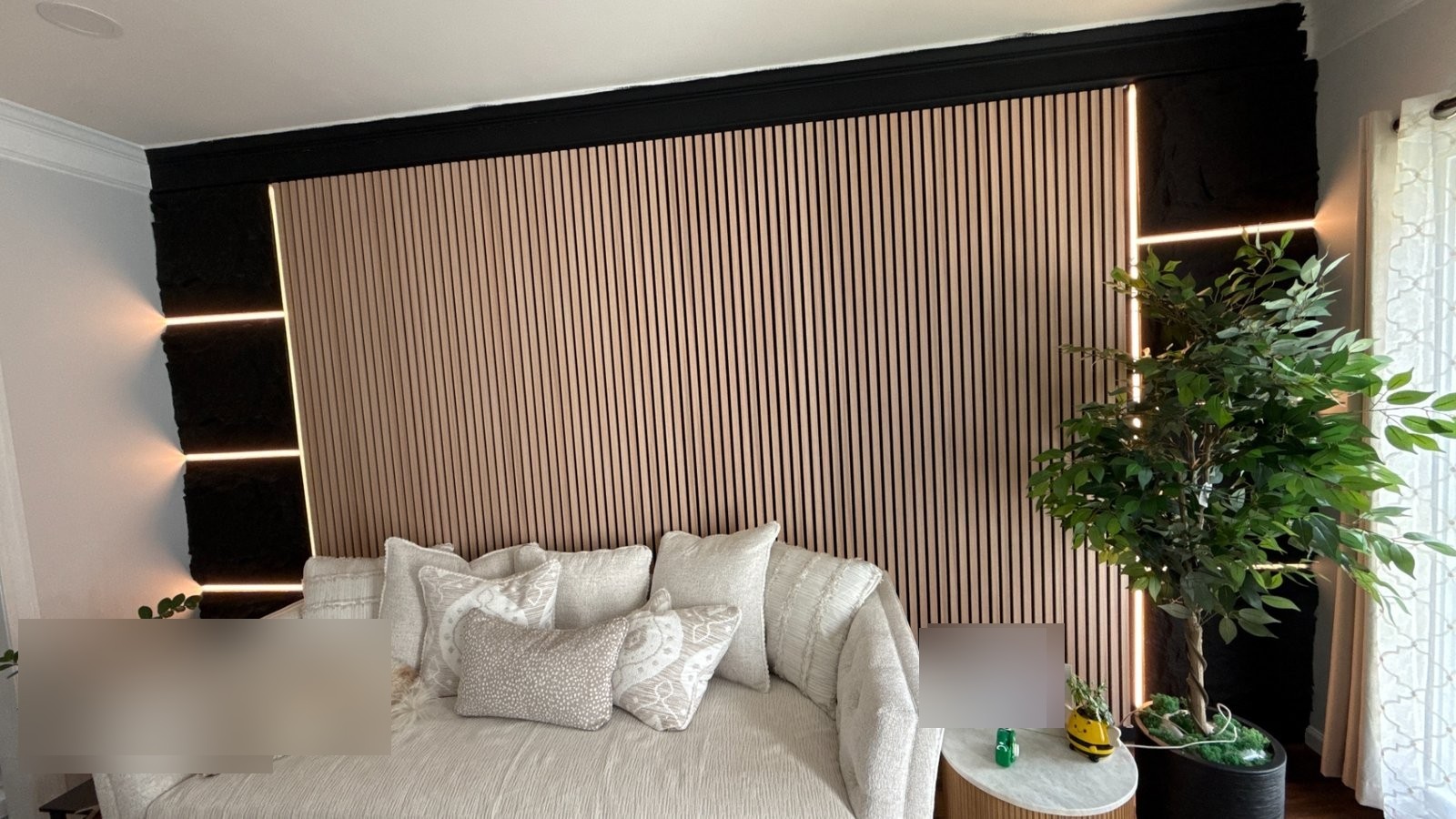 Wood-slat and faux-stone feature wall with integrated LED lighting