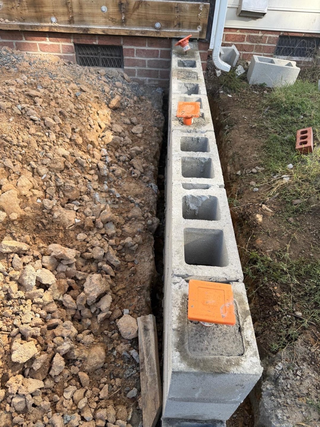Structural block foundation and drainage work